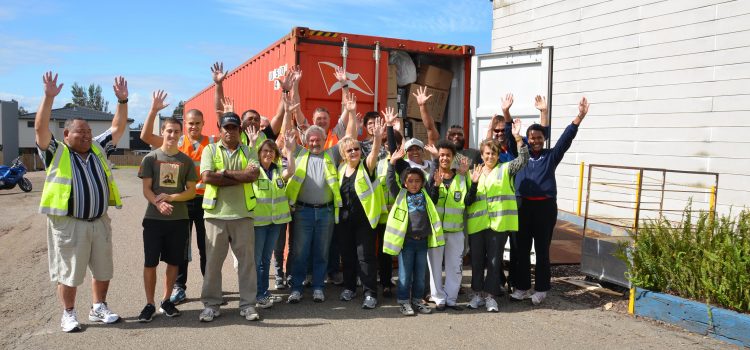 How Can DIK Help? Packed Container outside DIK with volunteers